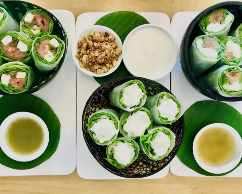 Spring rolls served in the garden of WILD Siem Reap